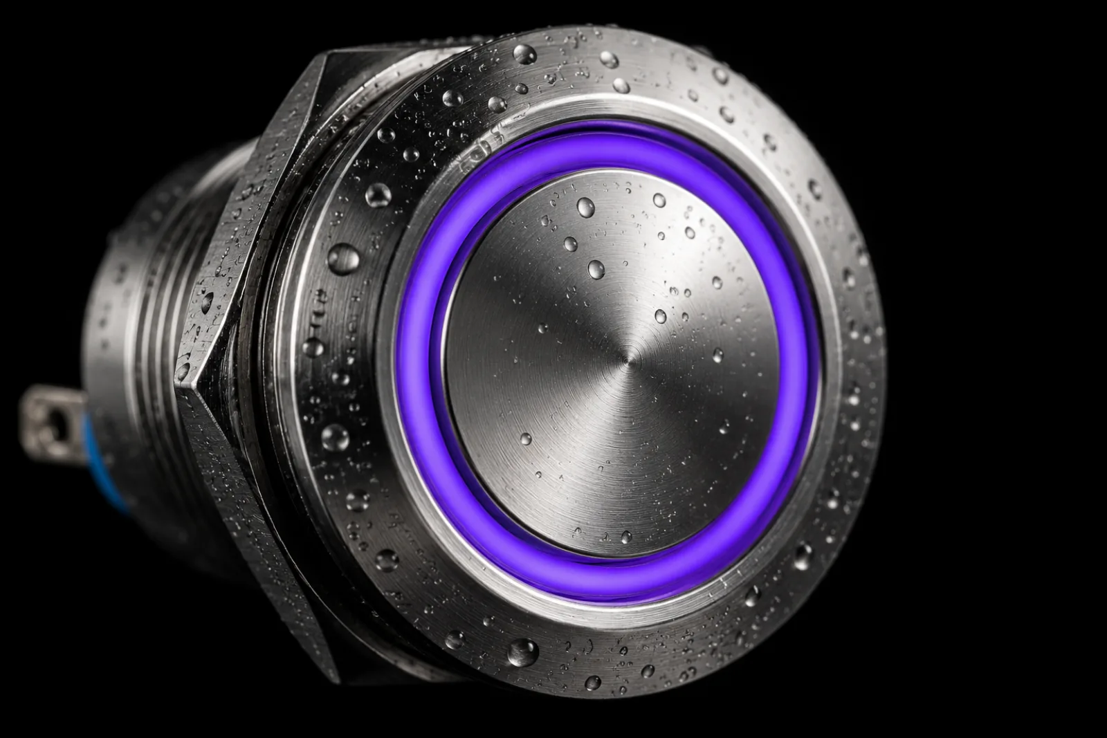 Close-up do Botão Mágico Filazero com anel violeta iluminado
